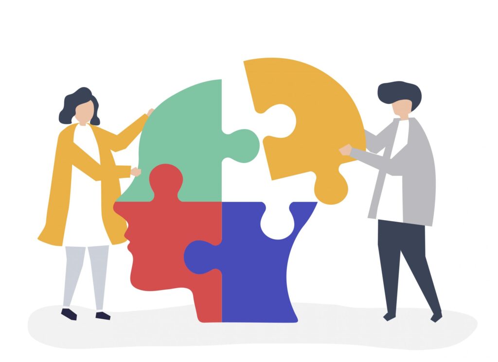 Illustrazione simbolica di persone che assemblano un puzzle rappresentante una testa umana, simboleggiando la collaborazione e il lavoro sulle relazioni nella psicoterapia sistemico-relazionale.